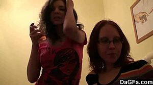 two teen lesbians play with camera in bedroom