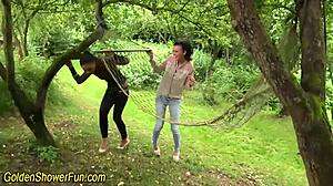 watersports lesbo outside with fingering and golden shower