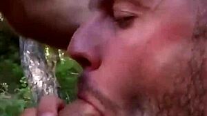 Public gay cruising with a huge dick blowjob outdoors.