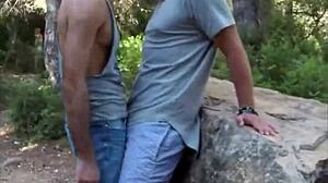 Public gay cruising with a huge dick blowjob outdoors.