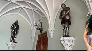 Queen undressing for butler in castle striptease