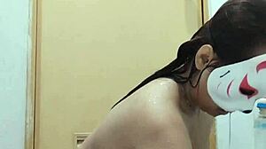 Sensual Filipina showers soaping big boobs in homemade video.