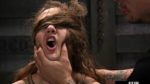 Bound BDSM sub clamped and pounded by dominant master.