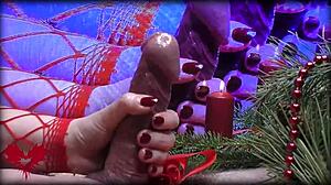 Mrs santa claus gives her husband a handjob while fingering his peehole