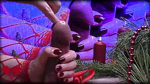 Mrs santa claus gives her husband a handjob while fingering his peehole