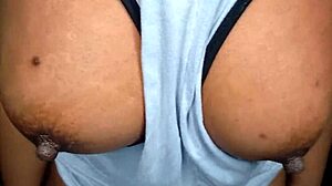 Ebony girl tempts with beautiful features in close view