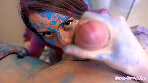 How does the petite 18+ teen get covered in colours and pleasured by her lover in the couple? Fucking bent over.