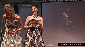 Strippers undress and tease the crowd.