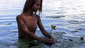 Naked Redhead Teen 18+ Teases With Water Lily.