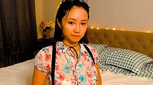 Little 18+ Asian girl in cosplay masturbates on webcam