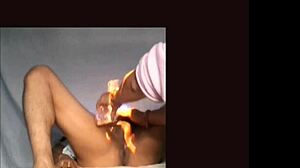 She starts with a HANDJOB, then moves to FINGERING her wet pussy.