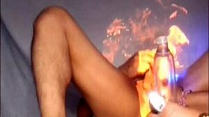 She starts with a HANDJOB, then moves to FINGERING her wet pussy.