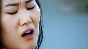 asian beauty takes on blonde european in a steamy clash.