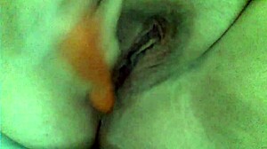 bbw enjoys inserting carrot into her juicy wet pussy and ass