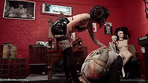 Punk Rock Goddess Pegging Inked Man In Bondage