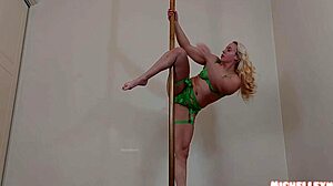 Watch this hot blonde bodybuilder perform an incredible pole dance in sexy lingerie