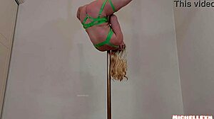 Watch this hot blonde bodybuilder perform an incredible pole dance in sexy lingerie