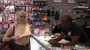 blonde sucks big black cock at gloryhole