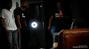 Busty milf engages in gangbang with 5 strangers simultaneously