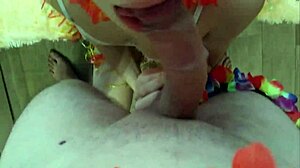 Wife gives blowjob to husband at Hawaiian party with kissing and licking.