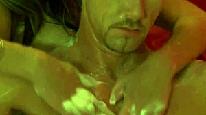 Arousing PUSSY MASSAGE of a man by MILF couple.