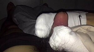 female colleague in white socks gives footjob until cum