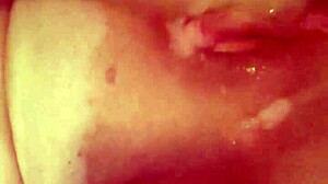 Horny housewife pleasures herself with dildo at home