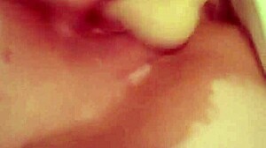 Horny housewife pleasures herself with dildo at home