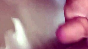 Sperm swims as he masturbates solo in the bath.