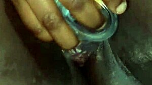 Ebony beauty feels intense pleasure squirting in solo session