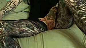 Tattooed woman in glasses encourages detailed jerking off