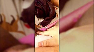 After shower, she masturbates with vibrator