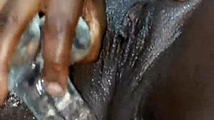 Ebony beauty feels intense pleasure squirting in solo session