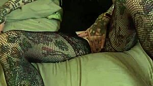 Tattooed woman in glasses encourages detailed jerking off