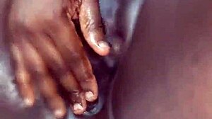 Ebony beauty feels intense pleasure squirting in solo session