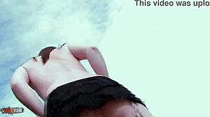 Hot Brunette Ally Removing Clothes On The Rocks At The Beach