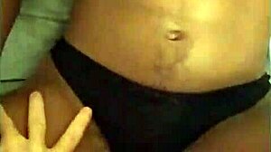 Ebony Tinder girl in intriguing encounter with panties aside.