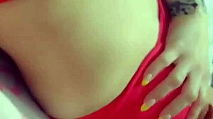 Puerto Rican redhead Latina babe shows off tits and ass in red bikini