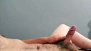 Young guy feels excited playing with his cock.