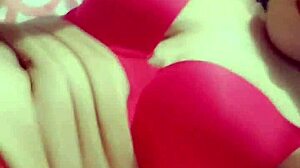 Puerto Rican redhead Latina babe shows off tits and ass in red bikini