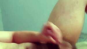 Young guy feels excited playing with his cock.