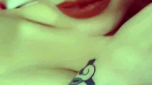 Puerto Rican redhead Latina babe shows off tits and ass in red bikini