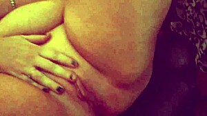 a redhead milf with big tits gets a huge cumshot on her face after squirting from a monster cock.