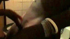 African lesbian devours friend's pussy in steamy bathroom