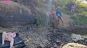 She met three guys at the river for an outdoor orgy, getting cum on her ass in cowgirl.