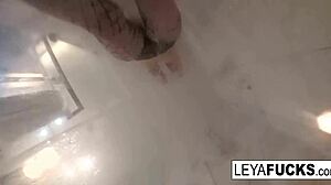 leya falcon brings a camera into the shower for a nude solo show.
