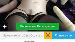 a chubby redhead chats and performs on webcam, showing off her curves.