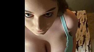 Busty babe gives blowjob while showing tits and ass!
