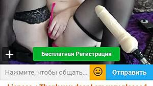 a chubby redhead chats and performs on webcam, showing off her curves.