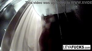 leya falcon brings a camera into the shower for a nude solo show.